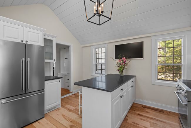 Gorgeous remodeled kitchen with quartz countertops and a spacious island | Image 5