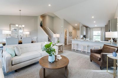 Open concept living with many ways to arrange furniture. Photo is of model home. Colors and options may vary. Ask Sales Agent for details. | Image 1