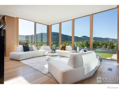 Living Room with Floor to Ceiling Windows / Doors and Expansive Views to the West and East. | Image 2