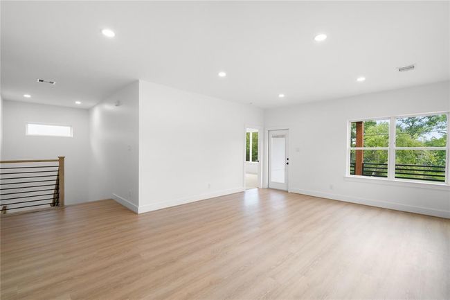 Look at this space! The door leads to the fabulous covered deck | Image 21