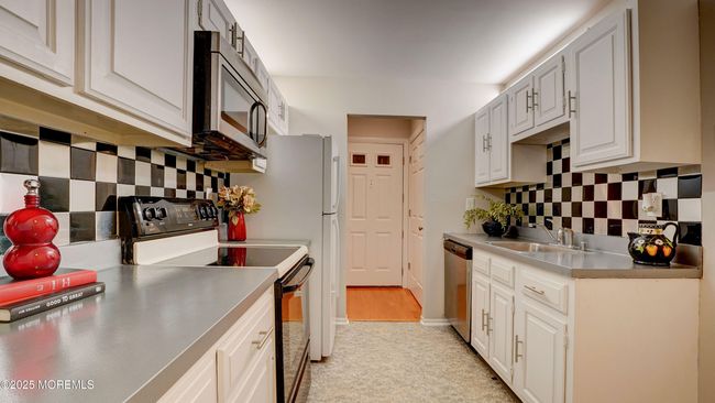 B - 233 Medford Ct, Home with 2 bedrooms, 2 bathrooms and null parking in Manalapan NJ | Image 16