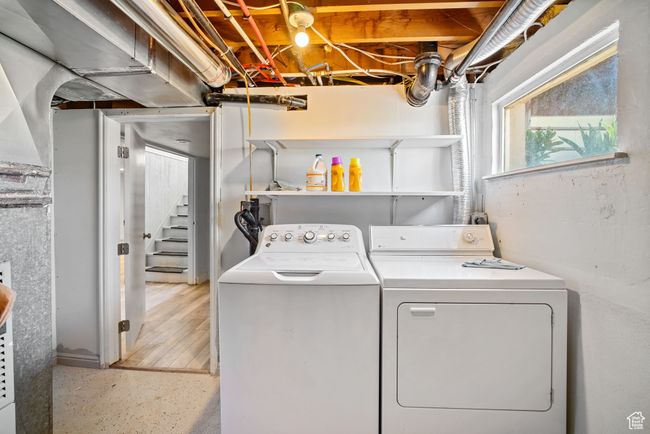 Laundry room with separate washer and dryer | Image 25