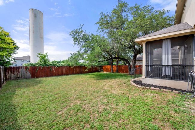View of yard featuring a sunroom | Image 30
