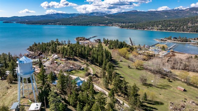 Drone / aerial view featuring a view of trees and a water and mountain view | Image 71