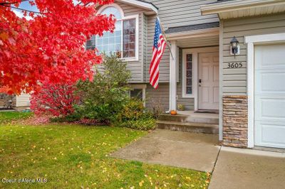 Beautiful red maple in this welcoming front entry. | Image 1