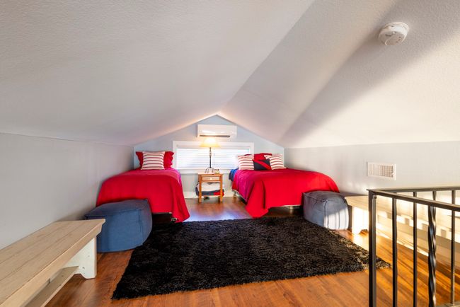 Loft sleeping enhanced by recently installed split unit air conditioning. | Image 14