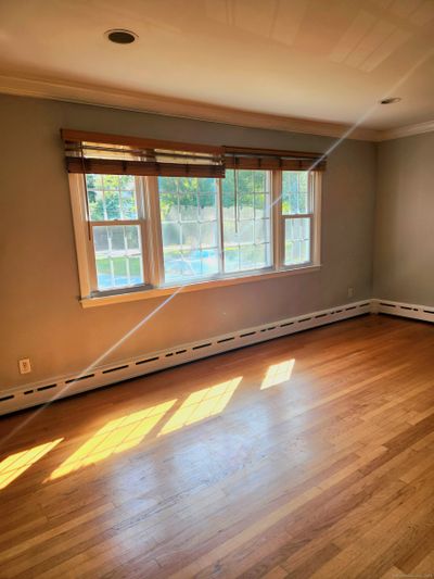 Shiny Hardwood floor throught! | Image 3