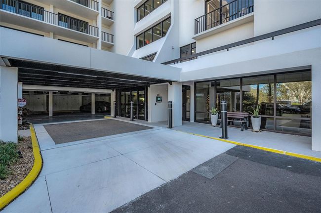 Entry Porte-Cochere and new Fob assisted sliding doors and entry directory. Fobs work at the back door as well! Not in a flood zone! | Image 36