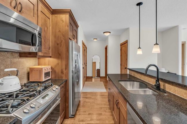 201 - 2100B Stewart Creek Dr, Condo with 2 bedrooms, 3 bathrooms and 1 parking in Canmore AB | Image 19