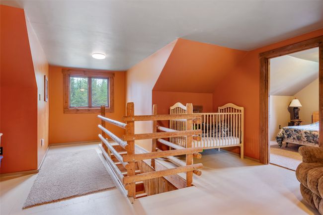 Stairs featuring lofted ceiling | Image 51
