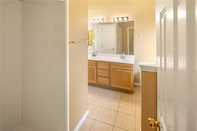 Primary bath with separate shower and tub. | Image 11