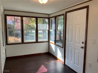 Unfurnished sunroom and HEATED with a wealth of natural light | Image 2