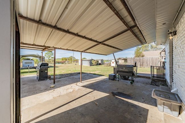 View of patio / terrace with a storage shed | Image 6