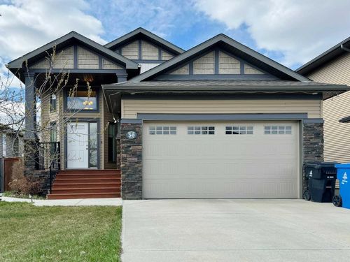 38 Riverland Close W, Home with 4 bedrooms, 3 bathrooms and 4 parking in Lethbridge AB | Card Image
