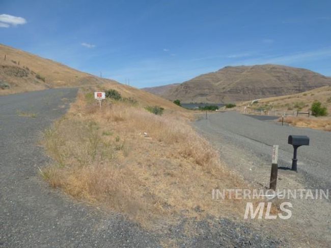 View of asphalt street with a mountain view | Image 10