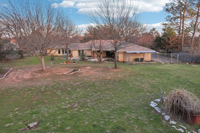 View of yard featuring fence | Image 38