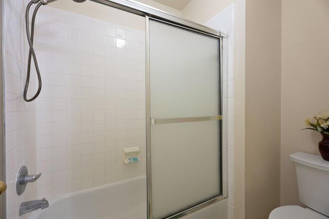 Your upstairs full bath features a tub/shower combo. All toilets in the house were replaced in 2023! | Image 22