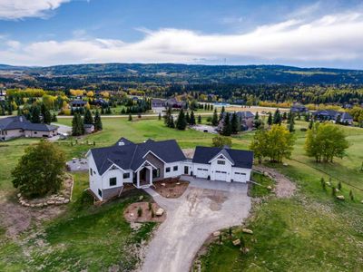 258027 166 Ave W, House detached with 4 bedrooms, 3 bathrooms and 8 parking in Foothills AB | Image 2