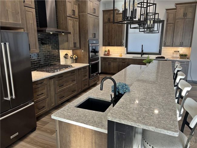 Entertain all your guests in this gigantic kitchen. | Image 8