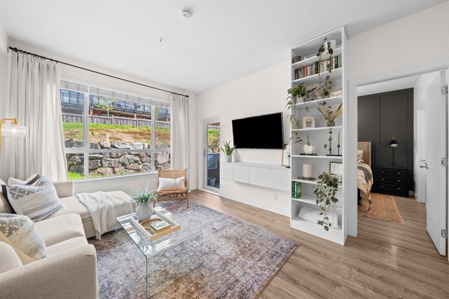 Living room featuring wood finished floors | Image 4