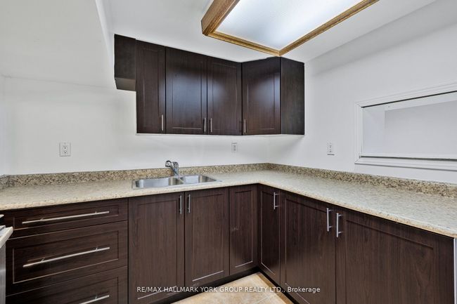 LOWER - 103 Micmac Cres, House attached with 2 bedrooms, 1 bathrooms and 1 parking in North York ON | Image 8
