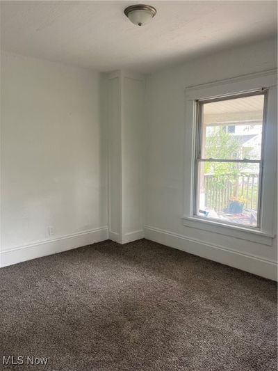 Unfurnished room with carpet flooring | Image 3