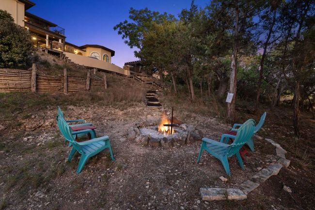 View of yard with a fire pit | Image 6