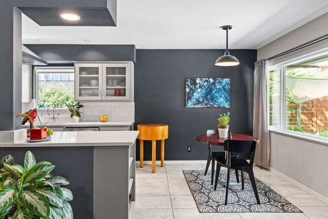 Notice the vintage-inspired pendant light above the breakfast nook. | Image 18
