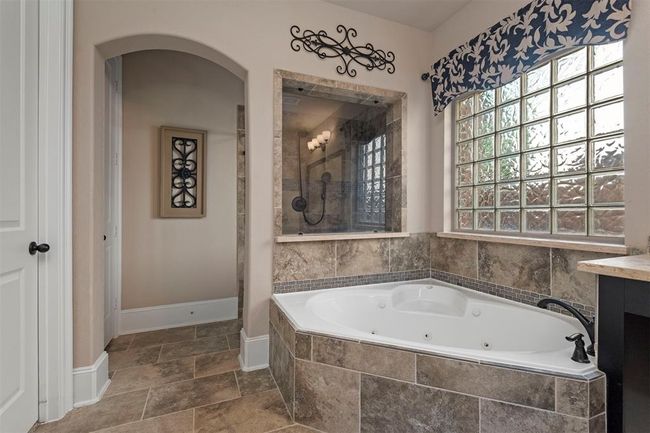 Jetted tub with seat. | Image 24