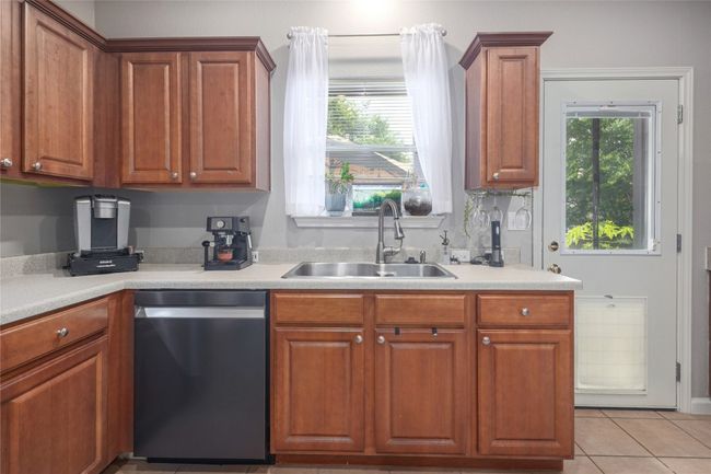 Lots of natural light flowing into the kitchen! | Image 10