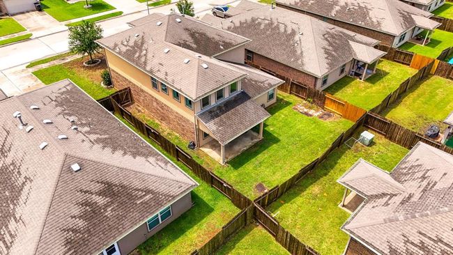 An aerial view of the home in location to its neighbors. | Image 48