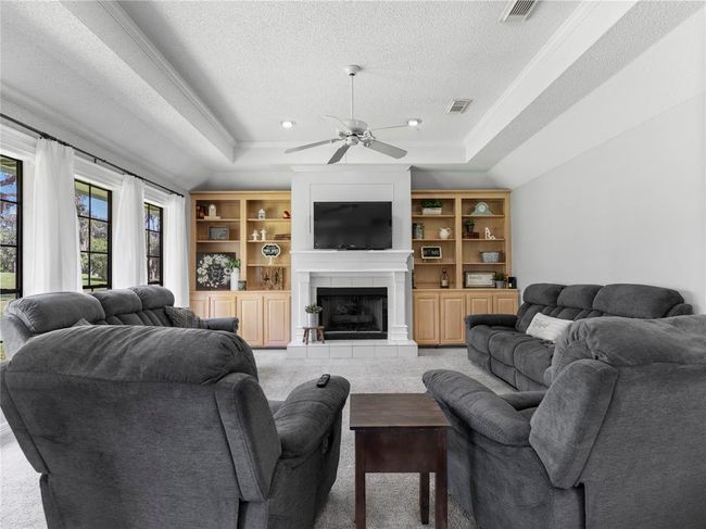 Main living area with gas fireplace | Image 29