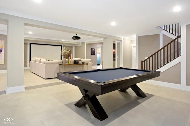 Enjoy endless entertainment in the lower level game room-perfect for billiards, movies, or hosting friends. | Image 8