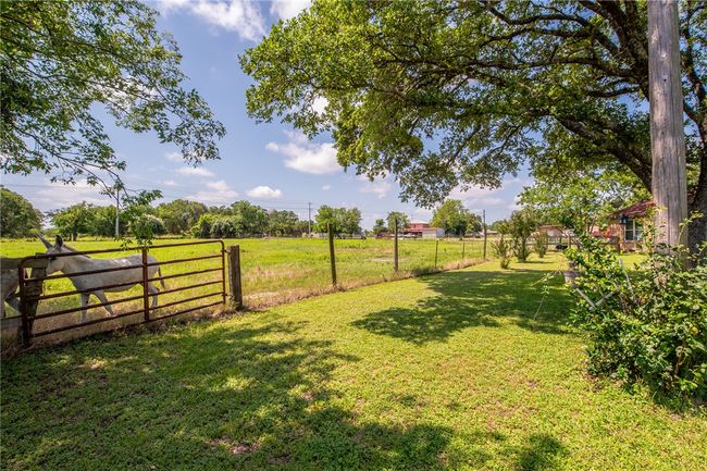View of yard with a view of countryside | Image 8