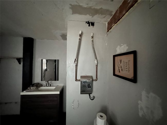 Bathroom featuring vanity | Image 11