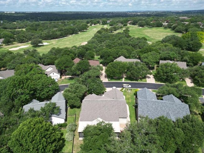 Aerial view of residential area featuring a golf course. Home is bottom center in pic | Image 38