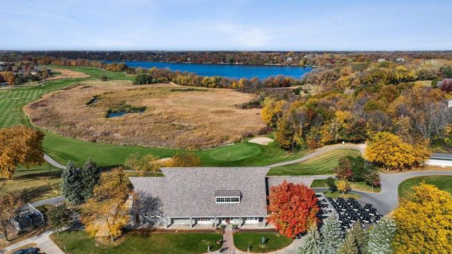 Just a short walk from Oak Creek, Chaska Town Course club house and seasonal restaurant overlooks the 18th green and Lake Bavaria. | Image 52