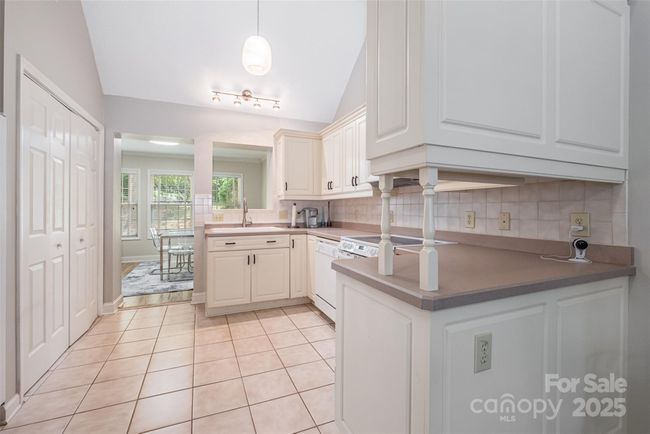 Bright, white kitchen with lots of counter space! | Image 10
