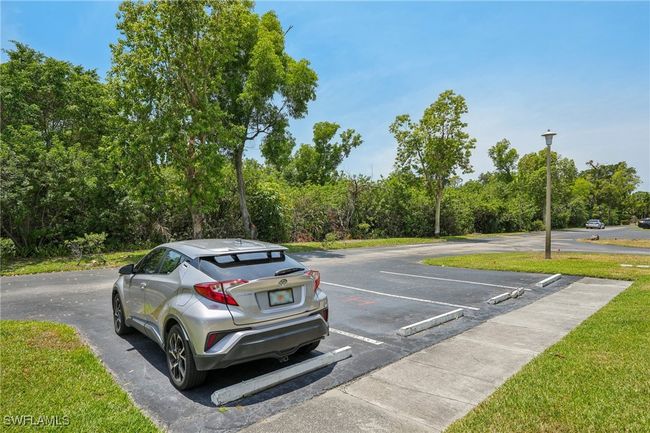 View of uncovered parking lot | Image 32