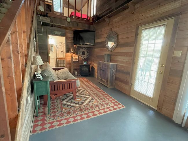 Living Room with Upstairs Loft Area | Image 19