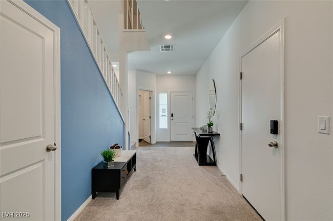 Foyer with baseboards, visible vents, recessed lighting, and carpet | Image 35