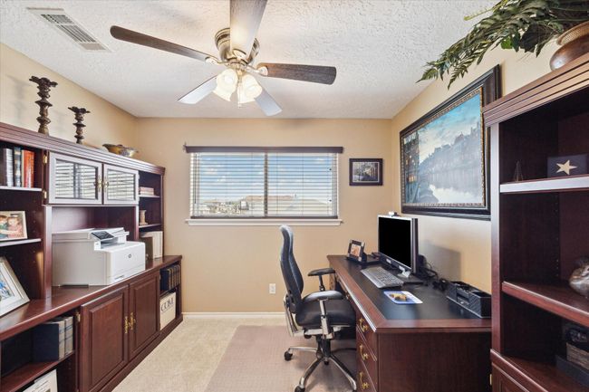 Elevate your productivity in this top-level private study, ideal for a home office. | Image 17