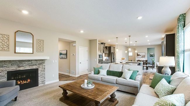 The open concept floorplan allows conversation to flow easily between kitchen and living spaces! | Image 18