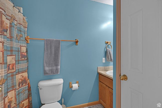 Bathroom with vanity and toilet | Image 12