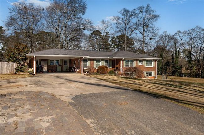 4983 Arcado Rd Sw, House other with 5 bedrooms, 2 bathrooms and 6 parking in Lilburn GA | Image 9