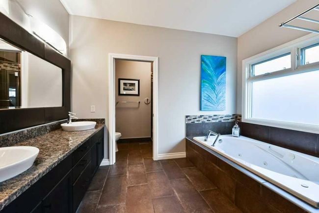54 Sienna Ridge Landing Sw, Home with 5 bedrooms, 3 bathrooms and 6 parking in Calgary AB | Image 37
