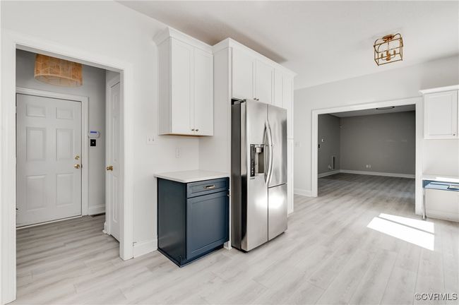 Kitchen with view to laundry/mud room and garage | Image 20