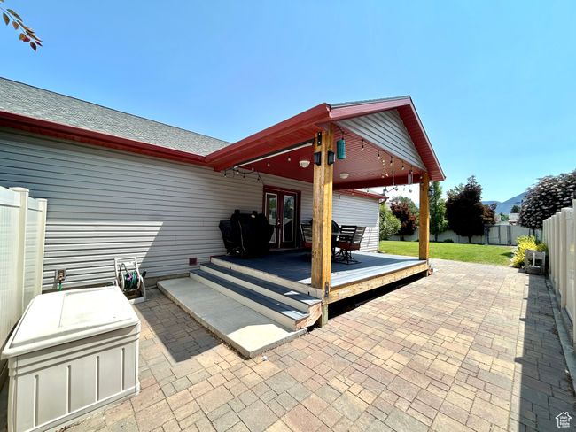 View of patio featuring french doors and a wooden deck | Image 30