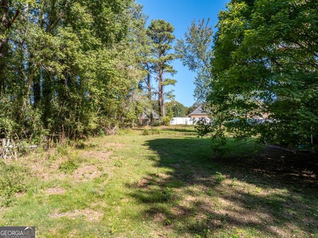 724 Cowan Rd Se, House other with 5 bedrooms, 4 bathrooms and 3 parking in Conyers GA | Image 11