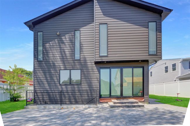 Back of property with a patio and a fenced backyard | Image 32